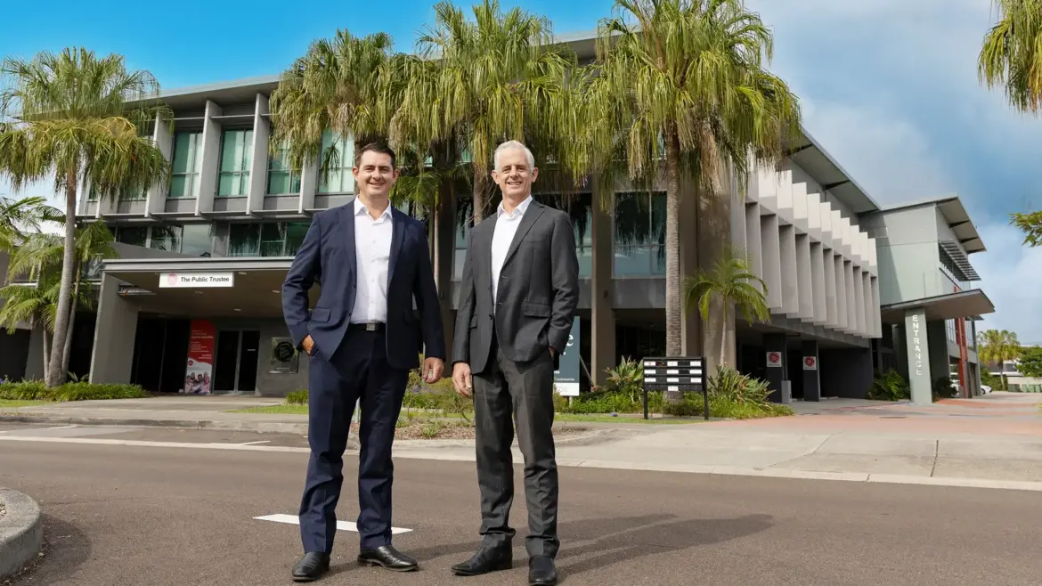image of josh and remi in front of Birtinya property acquisition