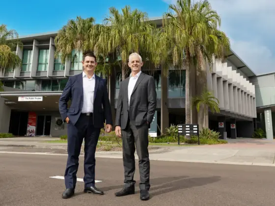 image of josh and remi in front of Birtinya property acquisition